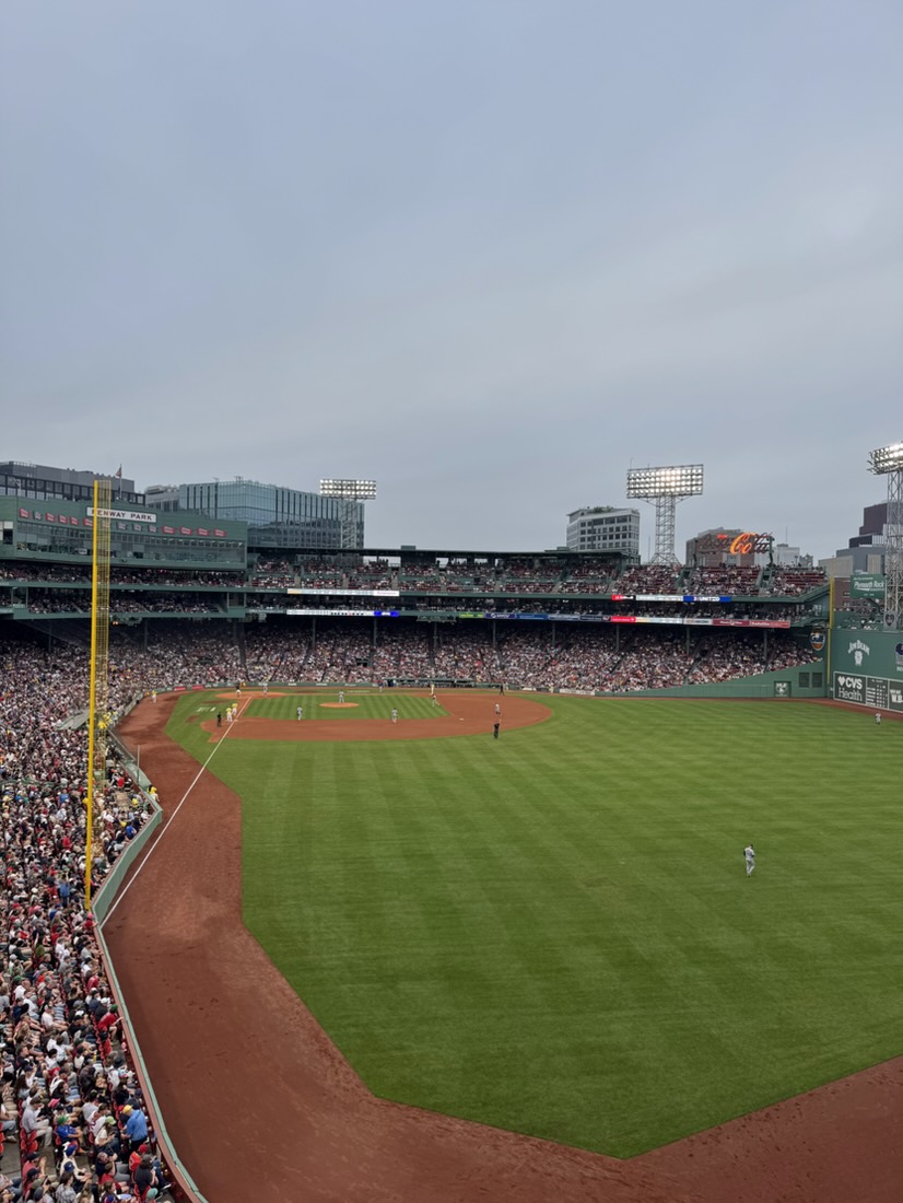A packed Fenway Park seen from high above the right field line